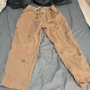 Urban Outfitters smiley face corduroy pants
